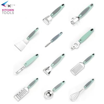 China Viable TPR Peeler Ginger Slicer Egg Separator Scald Proof Pizza Shovel Wheel Knife Tool Kitchen Instruments Cookware Set for sale