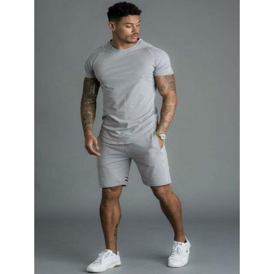 China New Casual Men's Sports Breathable Short Sleeve Suit Solid Color Matched Color Men's Two Piece Set for sale