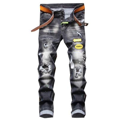 China QUICK DRY Letterprinted Stretch Ripped Jeans With Fabric Straight Leg Jeans for sale