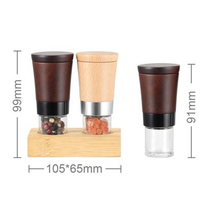 China 25ml Mini Glass Base Beech Wood Salt and Pepper Spice Set Bamboo Top Grinder Sustainable Jar Design New for sale