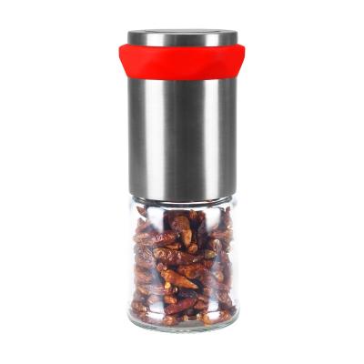 China 2021 New 304 Stainless Steel 100ml Glass Red Chilli Pepper Jar High Quality Viable Manual Dry Dry Grinder With Red Band for sale