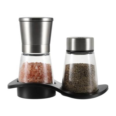 China Amazon 170mlX2 304 Stainless Steel Salt and Pepper Spice Shaker Viable Top Selling Ceramic Adjustable Grinder Set with Plastic Tray for sale