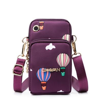 China Fashion New Women's Fashion Mobile Bag One Soft Mobile Men's and Women's Fitness Arm Bag Multi Layer Shoulder Messenger Bag Wallet for sale