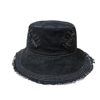 China Japanese Denim Fringed Basin Character Fisherman Hole Bucket Hat Korean Wild Sun Hat Sunscreen Hat for sale