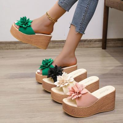 China Fashion trend summer large size sandals flower shape super high heels platform wedges special hot sale women's slippers with platform for sale