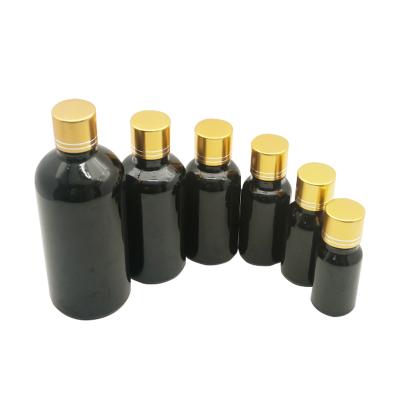 China Hot Selling Personal Care 5 In 100ml Empty Black Glass Essential Oil Bottle With Screw Cap Plastic Bottle for sale