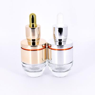 China 30ml Clear Empty Essential Oil Cosmetic Glass Bottle High End Cosmetic Container for sale