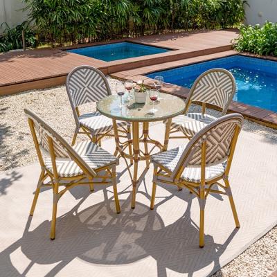 China Wicker Aluminum Bamboo Chairs And Garden Modern Outdoor Rattan Furniture Table Set French Bistros Restaurant Stacking Chair for sale