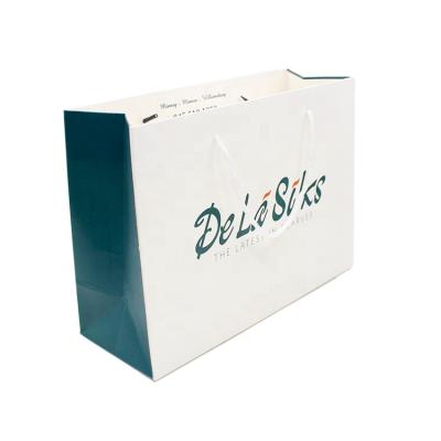 China Disposable Custom White Glossy Kraft Paper Art Paper Gift Bags For Shopping With Logo Printed Factory for sale