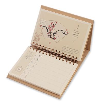 China Table calendar customized printing single page one day table calendar chocolate advent diy table calendar with pen holder for sale