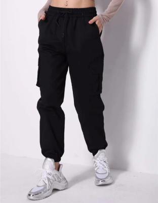 China New Anti-wrinkle Autumn Drawstring Cargo Pants Women Solid Color Loose Cargo Pockets Pants For Women for sale