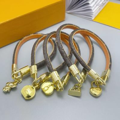 China Vintage Design Luxury Fashion PU Leather Embossed Bracelet With Lock For Jewelry Unisex Brass Wholesale for sale