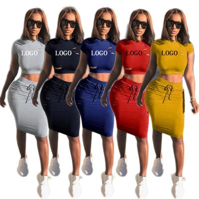 China Casual Summer QUICK DRY Solid Colors 2 Piece Short Crop Top And Hole Skirt Set Women 2 Piece Set Clothing for sale