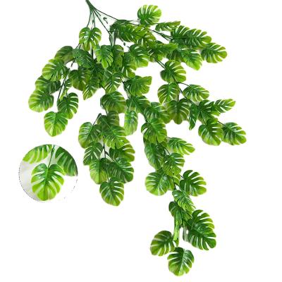 China Durable Fake Greenery Monstera Plant Tropical Palm Ivy Vine For Wall Bedroom Room Balcony Indoor Outdoor Decor for sale