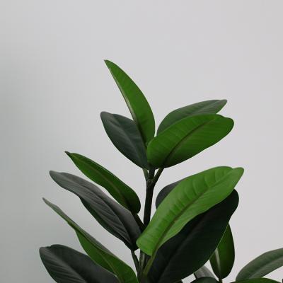 China Environmental Lush Artificial Foliage Garcinia Trunk Plastic Tree for sale