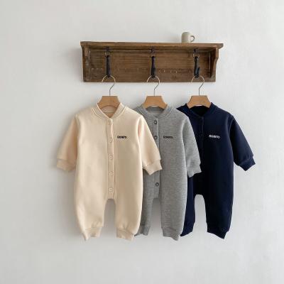 China Newborn Baby Unisex Jumpsuit Winter Loungewear Solid Basic Button Simple Cotton Long Sleeve Jumpsuit Rompers For Toddler Boy Infant Girl for sale