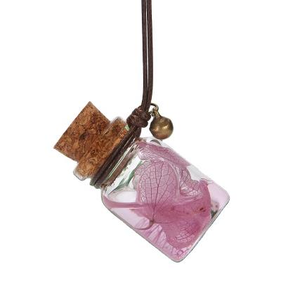 China Recyclable Creative Empty Perfume Bottle Car Perfume Bottle Art Small Fresh Handmade Perfume Hanging Hanging Bottle for sale