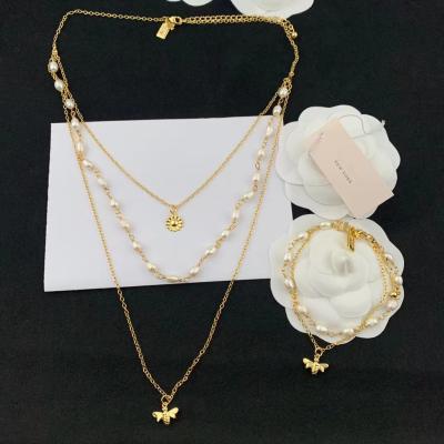 China 2022 Fashion Cute Bee Pendant Bead Multilayer Necklace And Bracelet Set Woman Jewelry Set for sale