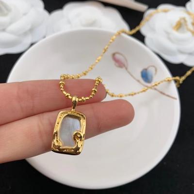 China Fashionable Wholesale Long Necklace Small Shell Women Gold Pendant Necklace for sale