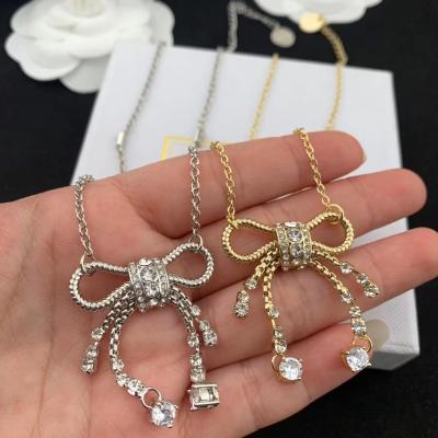 China FASHIONABLE Special High Quality Millimeter Crystal Bows Pendant Necklace For Women for sale