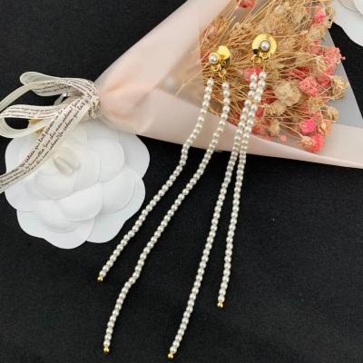 China 2022 FASHIONABLE white pearl tassel earrings new arrival summer very long tassel earring for sale