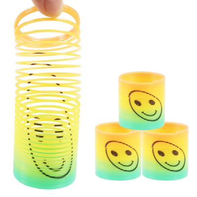 China Rainbow Spring Magic Novelty Toys Rainbow Circle With Face Mini Coil Spring Toy Magic Smile Spring 181 for sale