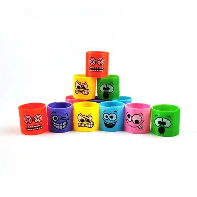 China 2021 most popular expression mini face rainbow circle unicorn coil smile toy 181 plastic spring ring for sale