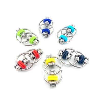 China Wiggle Person Toys Key Chain For Autism Toys Antistress Sets Anti Relaxation Bike Chain Spinner Key Metal Ring Puzzle Sensory Toys 4.5*3cm for sale