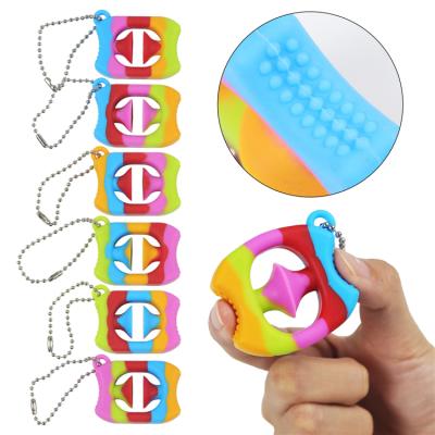 China Low Price Five Finger Force Silicone Suction Cup Silicone Toys Sensory Grip Ring Decompression Toy for sale