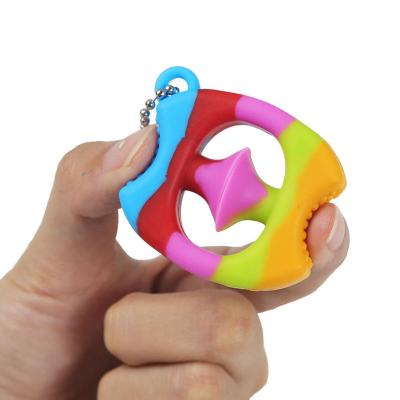 China Anti Finger Strain Silicone Sale Stress Reliever Occupier Toy Adult Snaps Hand Warmer Grip For Kids Kidds Ring Hand for sale