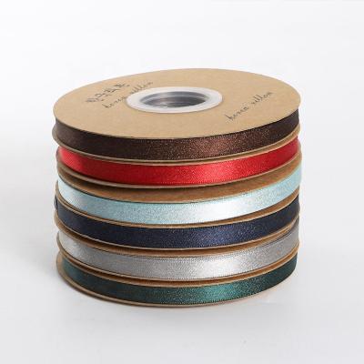 China Eco Fridendly EXW Price In Stock Satin Ribbon Gold / Silver Glitter Ribbon for sale