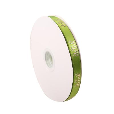 China 15mm Metallic 100% Polyester Satin Ribbon Roll Festival Ribbon With Gold Foil Plastisol Logo Gift Ribbon for sale