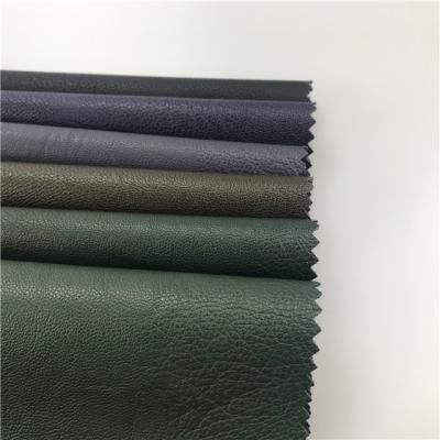 China Colorful Wholesale Abrasion-Resistant Faux Leather Artificial Textile Garment PU Leather Fabric for sale