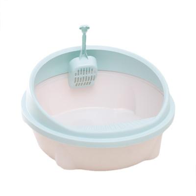 China Viable Wholesale Slanted Round Resin Splashproof High Side Cat Toilet Cat Litter Box for sale