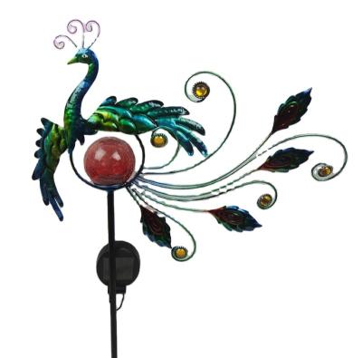 China Folk Art Metal Peacock With Solar Garden Light Decoration for sale