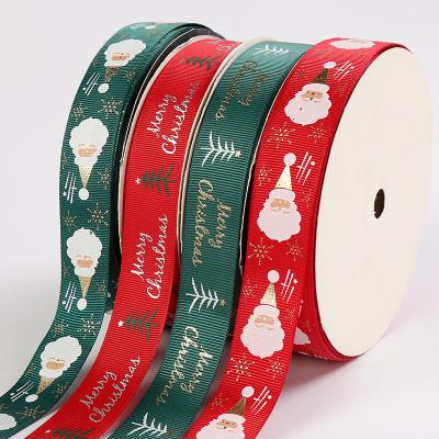 China New Sustainable Foil Gold Printed Christmas Tree Deer Santa Claus Snowman Grosgrain Christmas Ribbon For Wrapping for sale