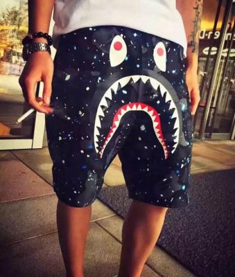 China 2021 Summer New Arrival Amz Graphic Anti Wrinkle Shorts Street Bape Casual Short Pants Impersonator Shark Slogan Women Pants Boy Monkey Unisex Pants for sale