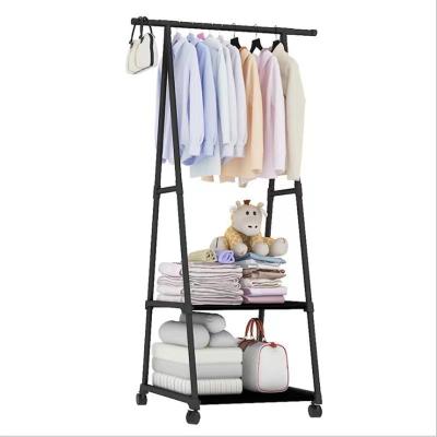 China Hot-selling eco-friendly material single coat rack can be movable hanging clothes rack household bedroom coat floor clothes rack triangle coat for sale