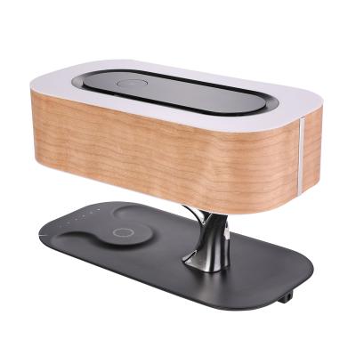 China Wireless Charger Speaker LED Ambient Light Table Lamp Stepless Dimming Wooden Tree Lamp Radio Charging 10W for sale