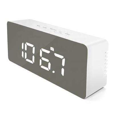 China LUMINOVA Style Portable Popular Korean Factory Digital FM Radio Alarm Table Clock Wholesale for sale