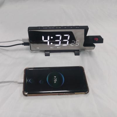 China Radio New Digital Projection Alarm Clock Wall Decoration Table Clock With Thermometer Humidity Radio Phone Charger for sale