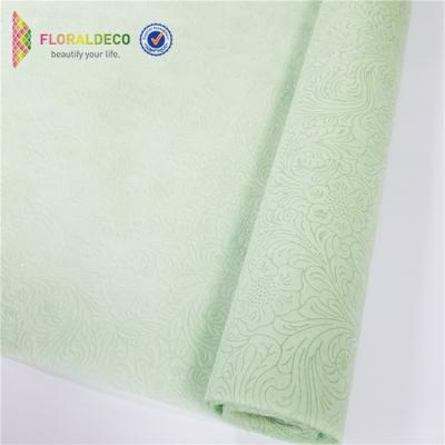 China Anti-bacteria 100% Polyester PP Wall Cloth Gift Flower Decoration Nonwoven Embossed Wrapping Wrappers Embossed Non Woven Fabric Roll for sale