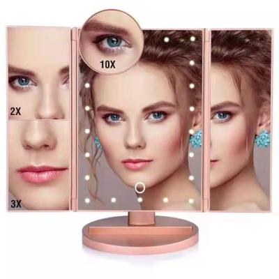 China Lighted Vanity Led Lighted Travel Makeup Mirror Desktop Folding Make Up Mirror With Lights for sale