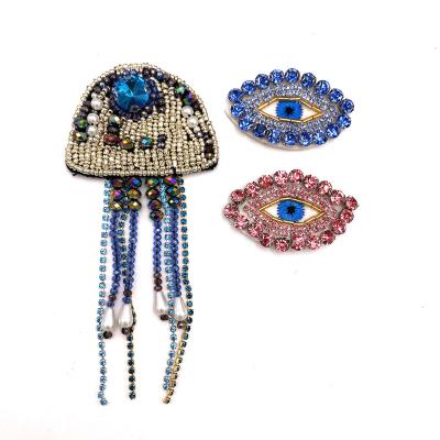 China Handmade Rhinestone Bead Eyes Sew On Applique Apparel Embroidery Sew-on Beaded Patch Eye Patches For Jackets for sale