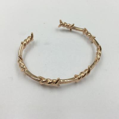 China Hiphop Customized Stainless Steel Bangle Bracelet Jewelry Gold Studs Twist Wire Mens Boys Bracelet Design for sale