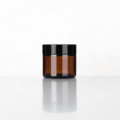 China Cosmetic Cosmetic Packaging 15g 30g Amber Glass Cream Jar With Plastic Caps for sale