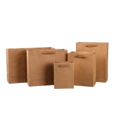 China New Fashion Recyclable Wholesale Hot Sale Kraft Paper Handbag Clothing Paper Bag for sale