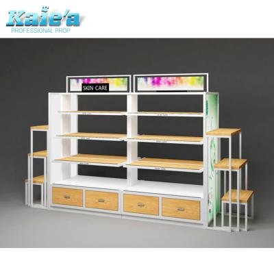 China Modern Wooden Metal Shop Makeup Display Rack Cosmetic Wooden Beauty Products Display Rack Gondola for sale