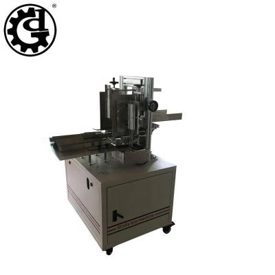 China Easy to use and cheap cost semi automatic carton box facial tissue sealing machine for sale