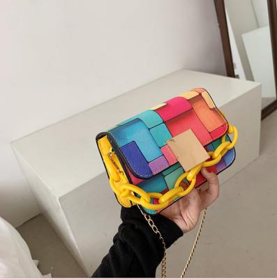 China 2021 waterproof new fashion character hit shoulder bag rainbow color small package single chain portable inclined shoulder bag 2107 for sale